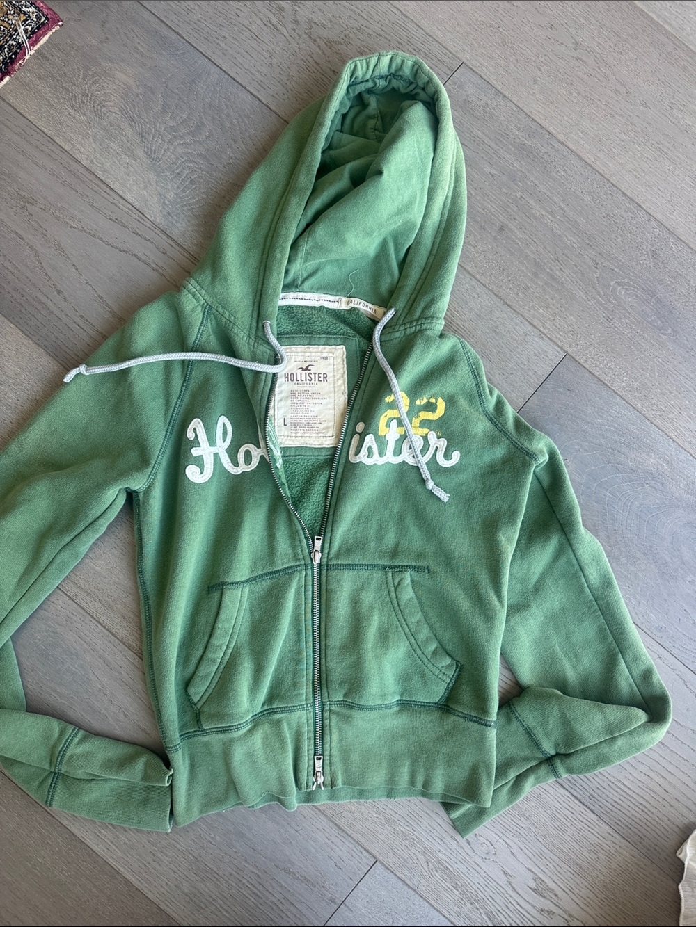 Hollister Sage Green Zip Hoodie with Embroidered Script